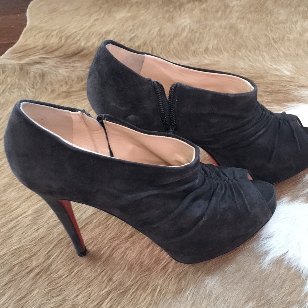 Christian Louboutin open toe suede heels.